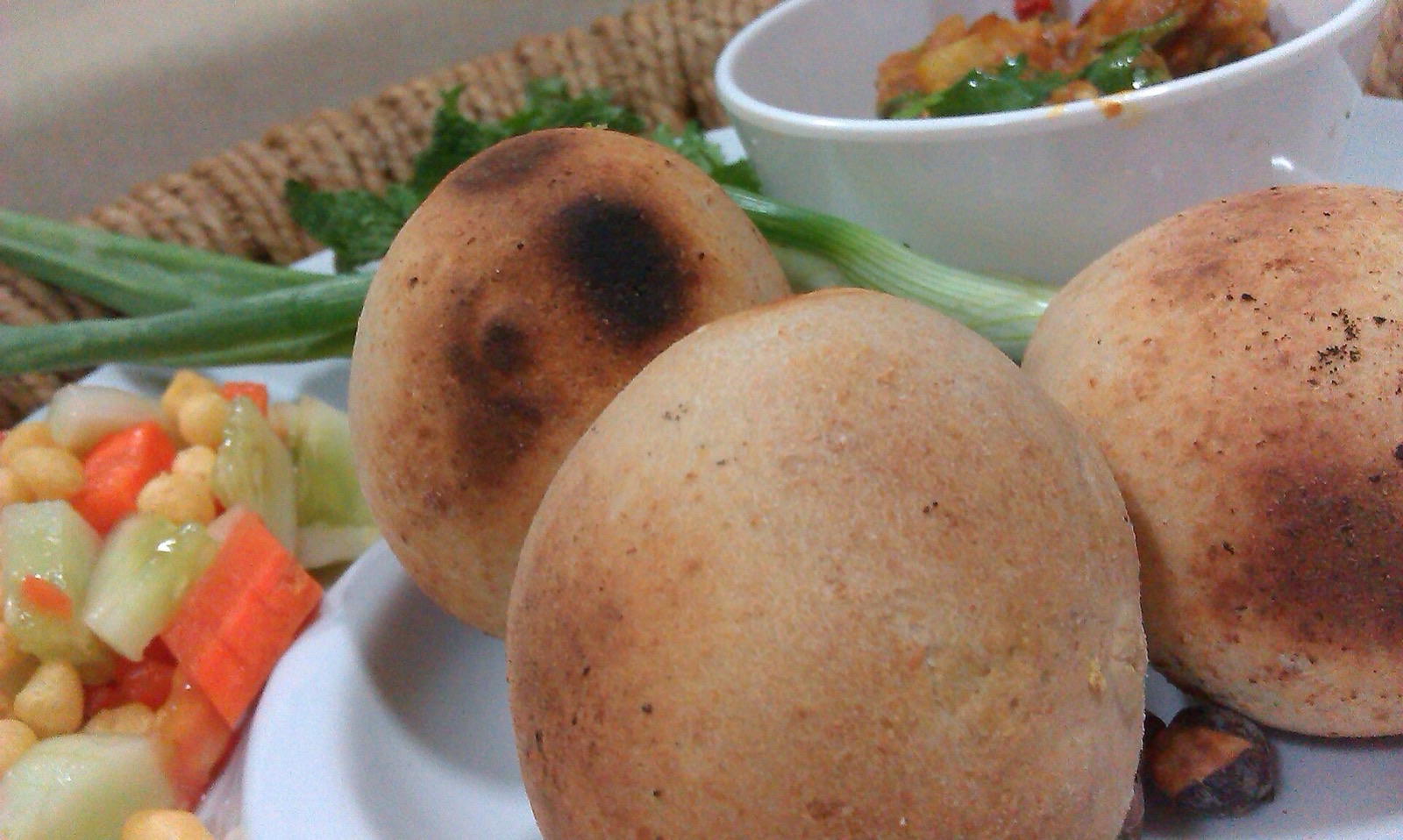 Litti chokha, the most famous Bihar food, served with chokha and salad